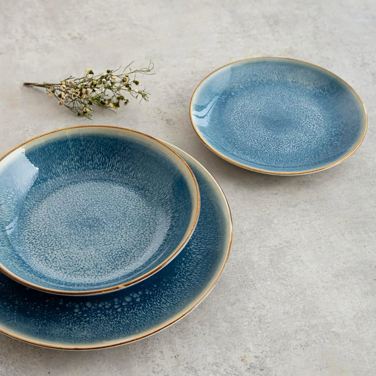 Aura Dinnerware Set – Light Blue Porcelain with Reactive Glaze